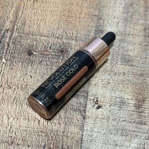 Makeup Revolution Liquid Highlighter Rose Gold New. 
Sealed unused
